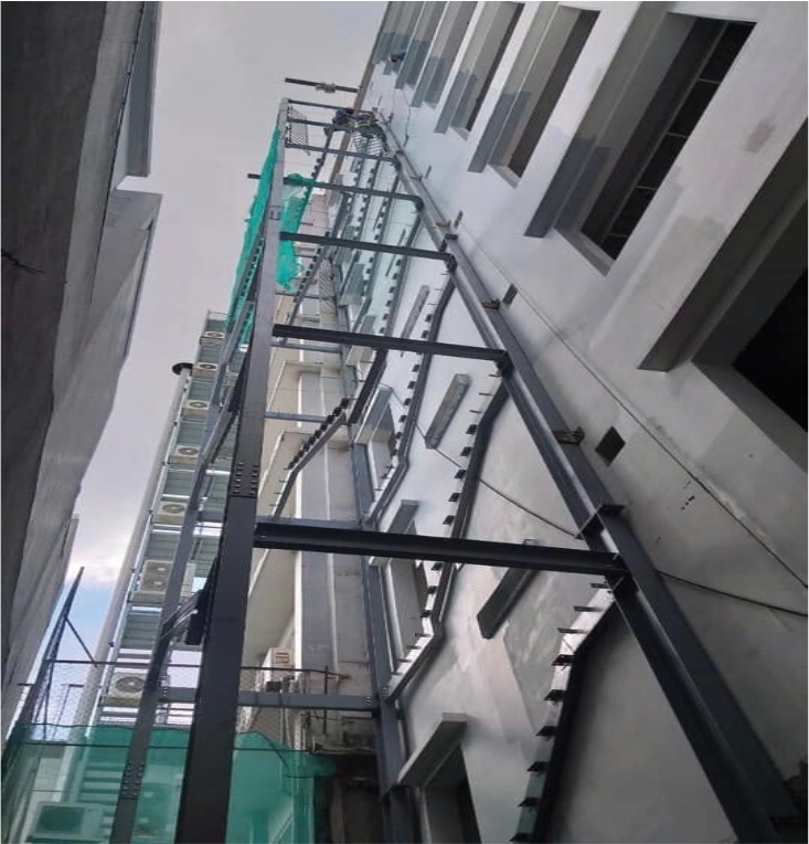 FIRE ESCAPE STAIRCASE CONSTRUCTION “KIM HANG BUILDING”, PARTITION WALL INSTALLATION “AEROTAC GARMENT FACTORY”.